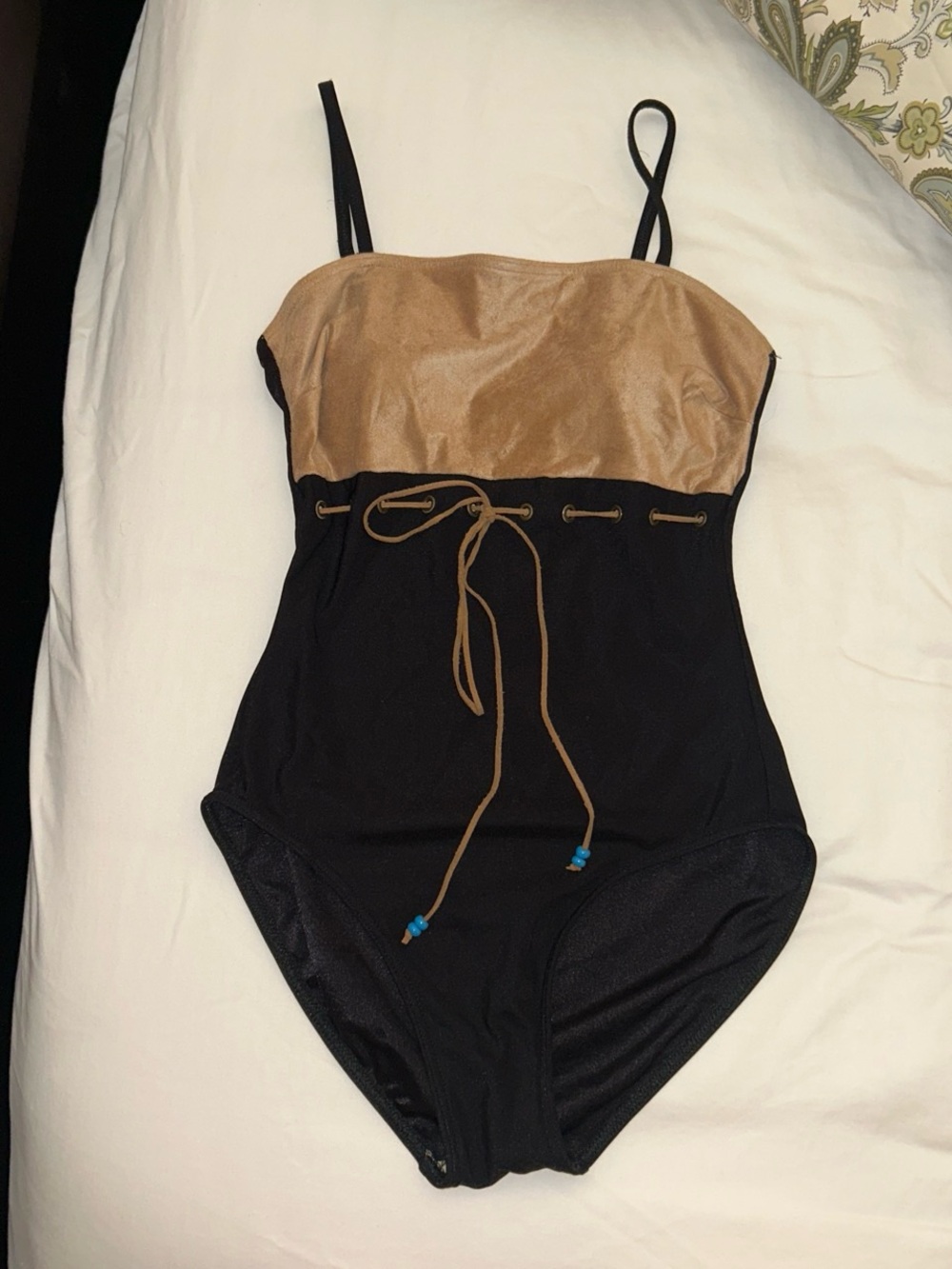 Black and tan two-tone one piece swimsuit with cute tie detail